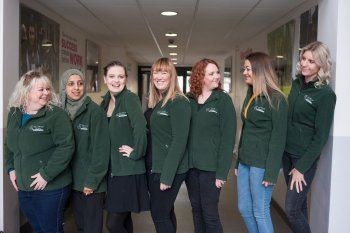 Image of Michelle with her team