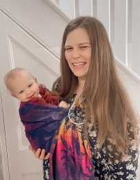 Caroline Basdon holding baby in sling