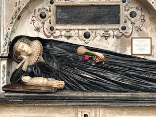 Sculpture in Lady Chapel in Gloucester Cathedral of woman and infant